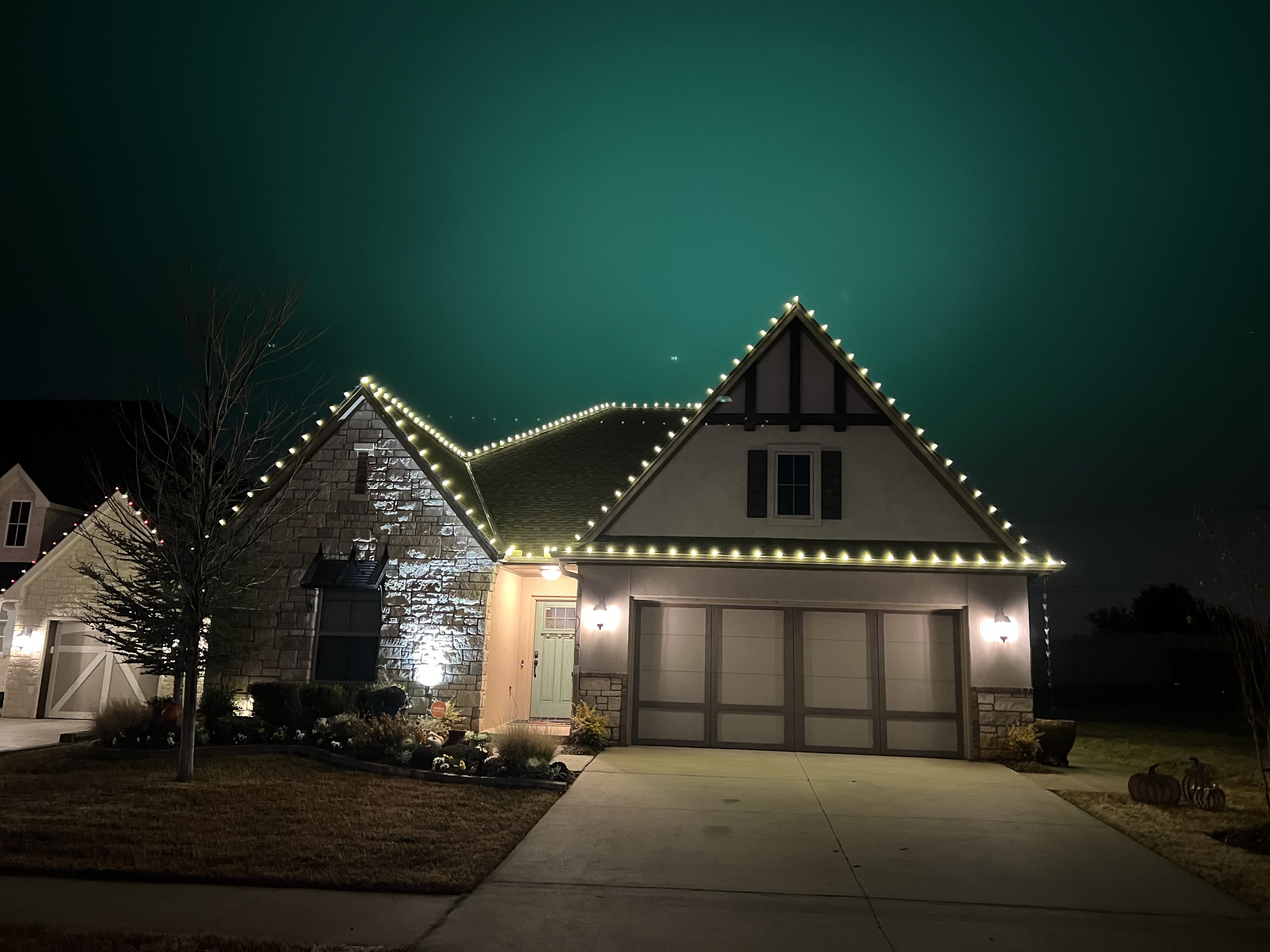 Crisp and clean Christmas light installation demonstrating our attention to detail and professional installation standards in The Village